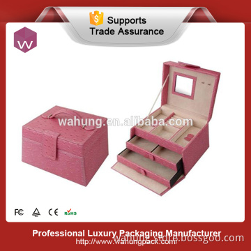 Pink leather display for jewelry box with drawer